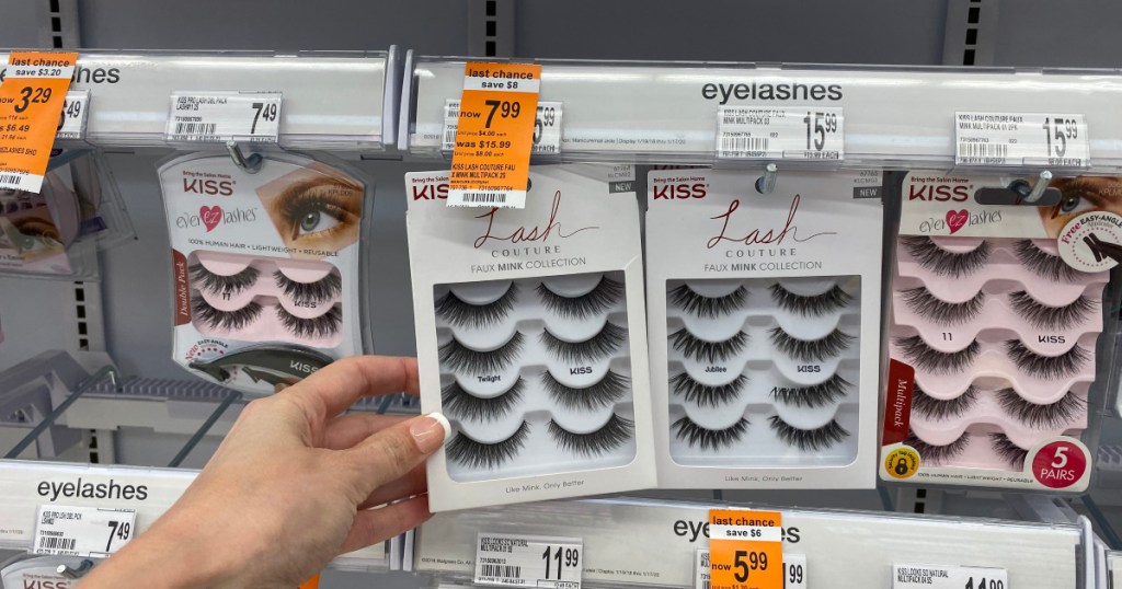 hand holding up kiss lashes at walgreens