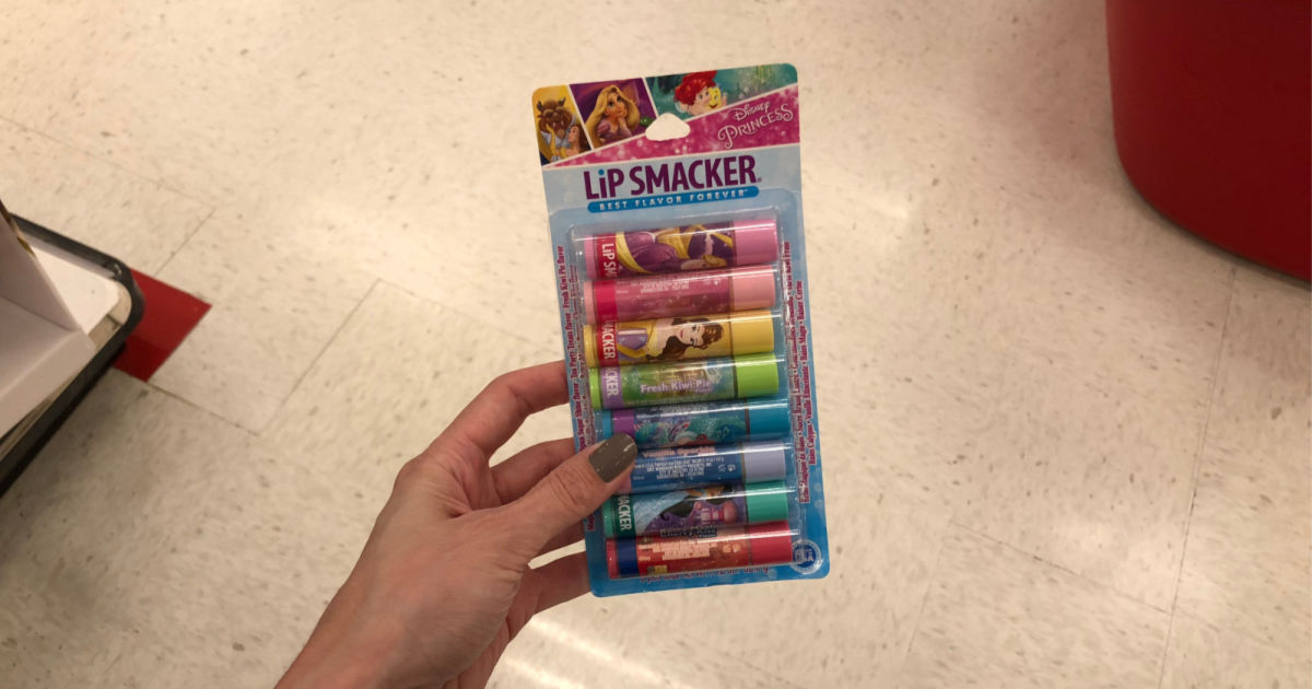 hand holding up lip smackers princess set