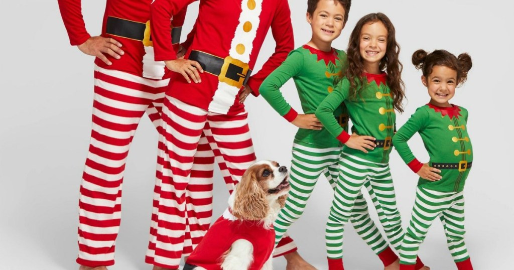 family wearing matching holiday pajamas from target