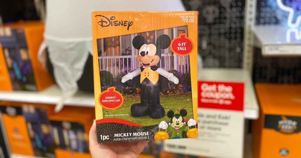 hand holding up mickey inflatable decor box at target