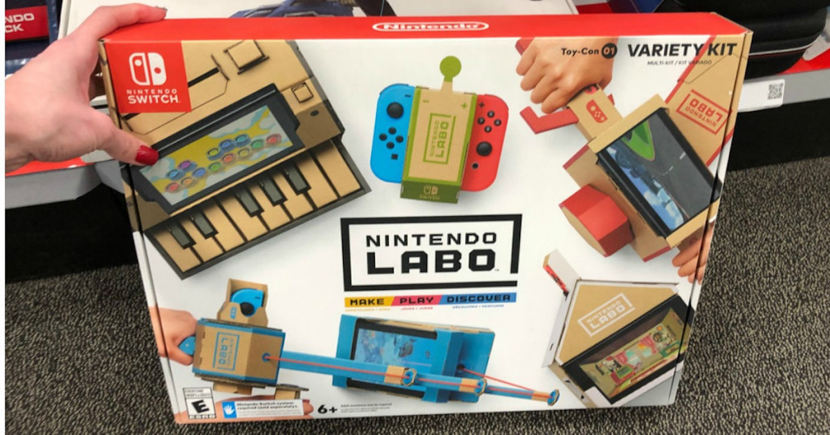 ladies hand holding Nintendo LABO Variety Kit at Walmart