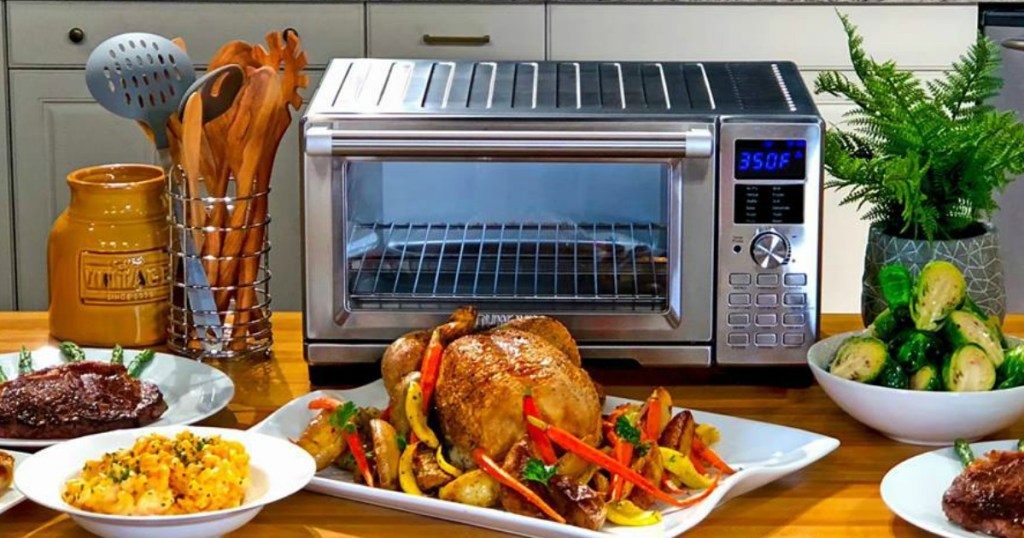 NuWave Bravo Convection Oven with food surrounding it