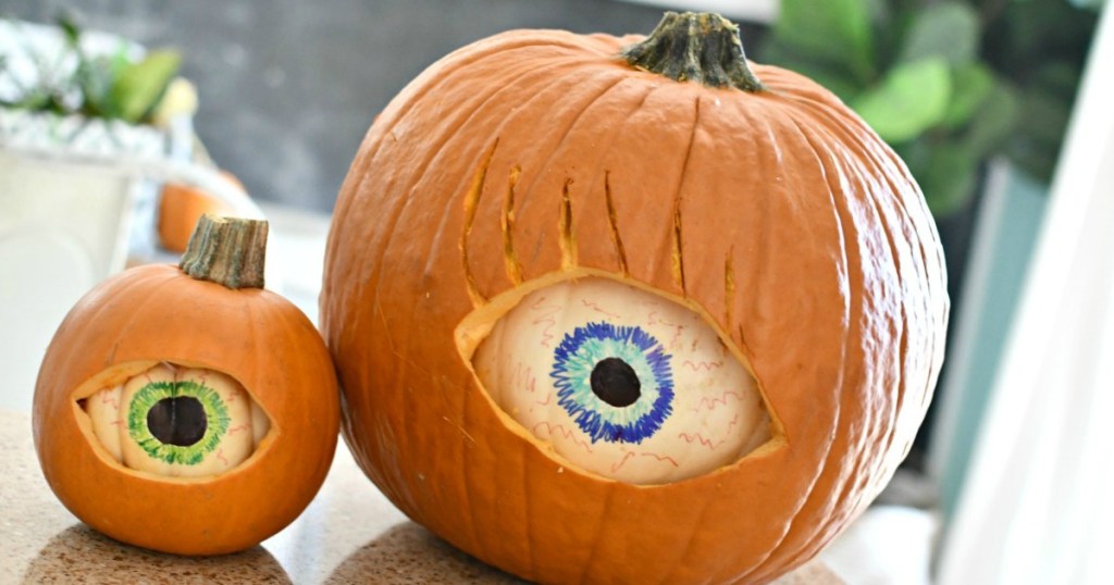 spooky eyeball pumpkin displayed on counter 
