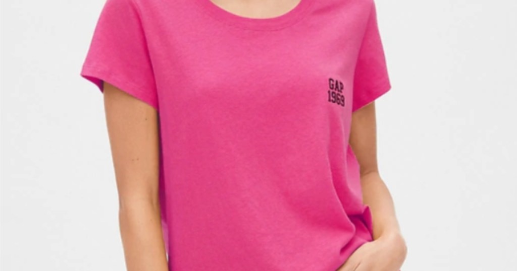 woman wearing pink gap logo crewneck