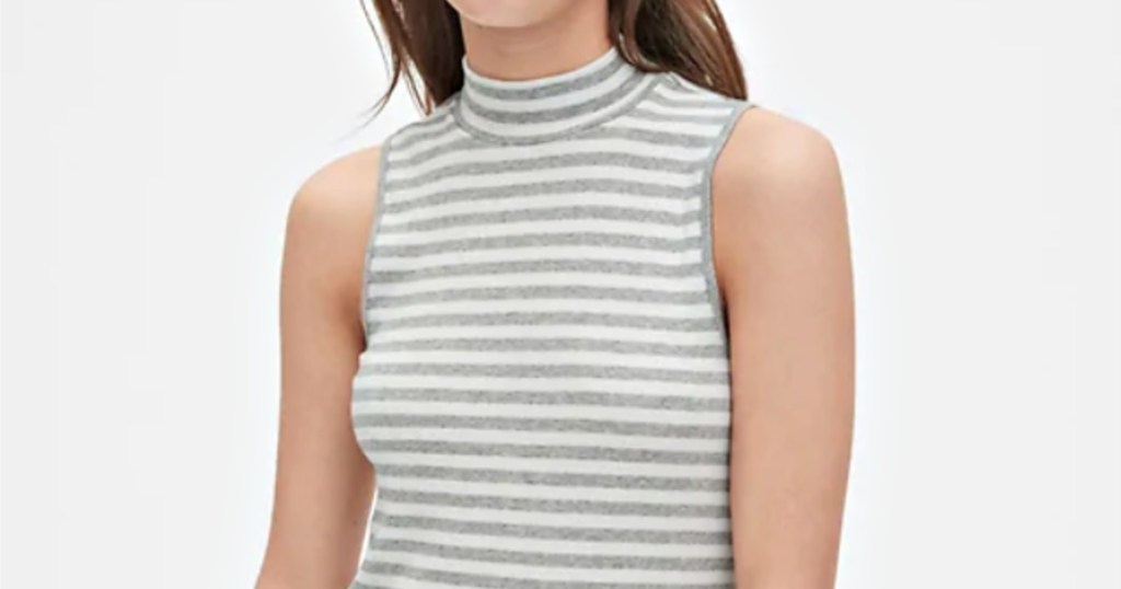 woman wearing white and gray striped tank