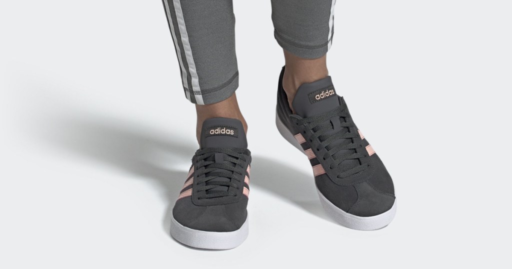 legs modeling gray and pink adidas shoes