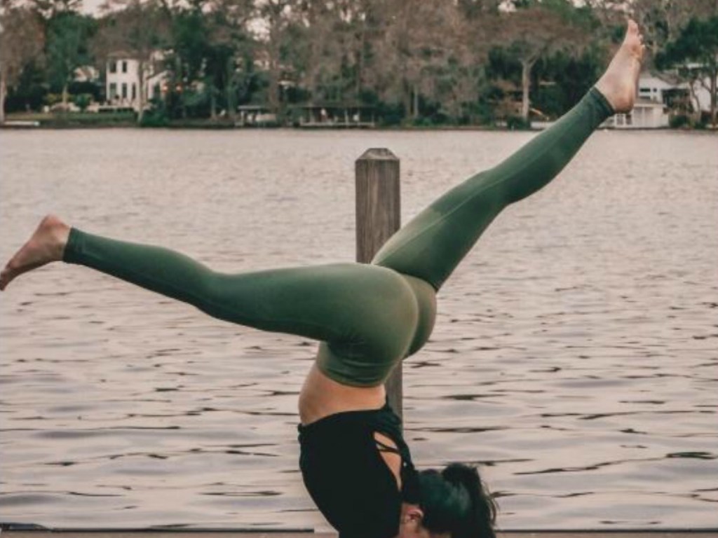 woman by water doing exercises