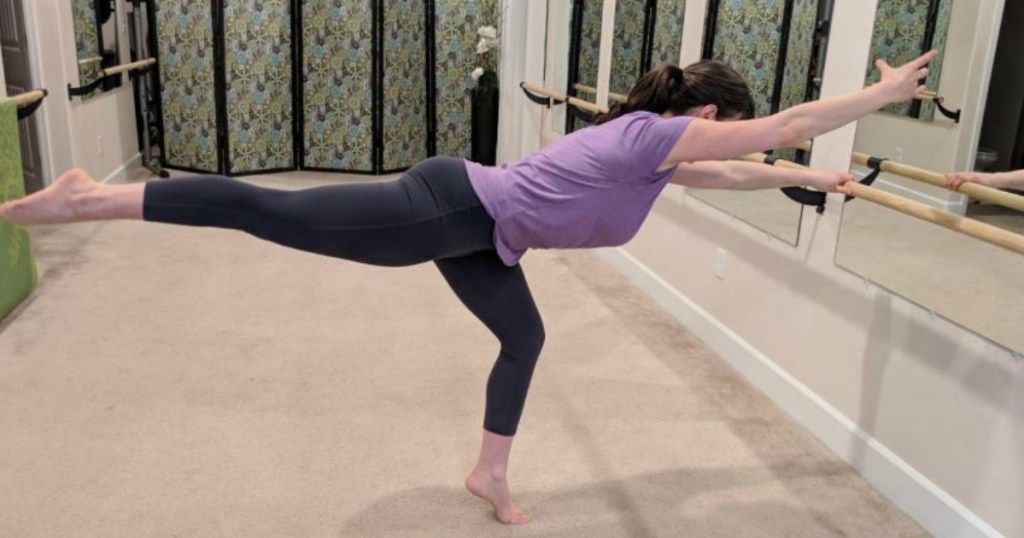 woman doing balance exercises in gym