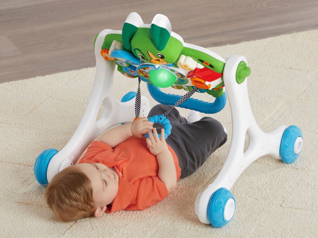baby on the floor playing with LeapFrog Scout Walker