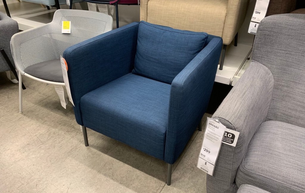 blue armchair sitting in IKEA store