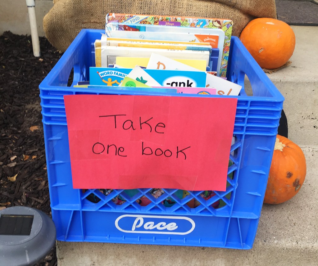 Donated book in bin on porch for Halloween