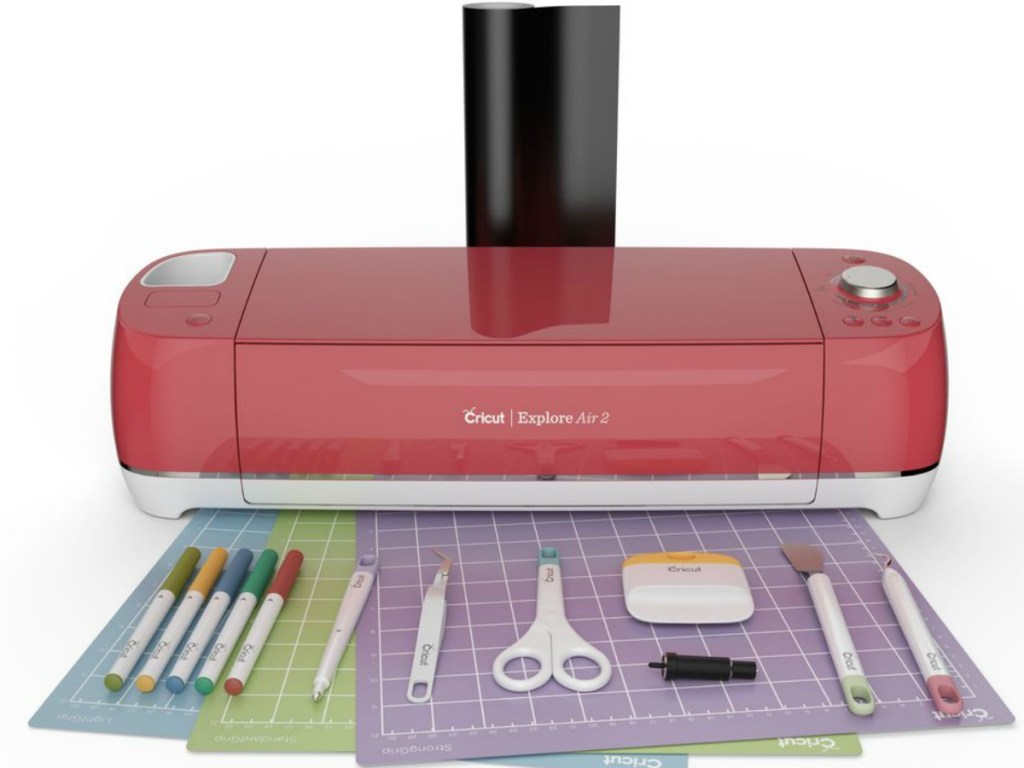 red colored machine that cuts out decals
