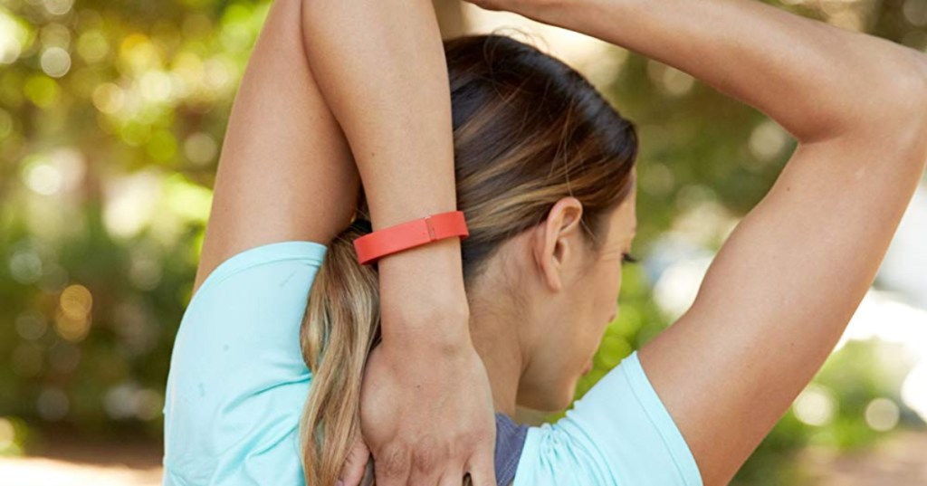 Woman wearing FitBit Flex 