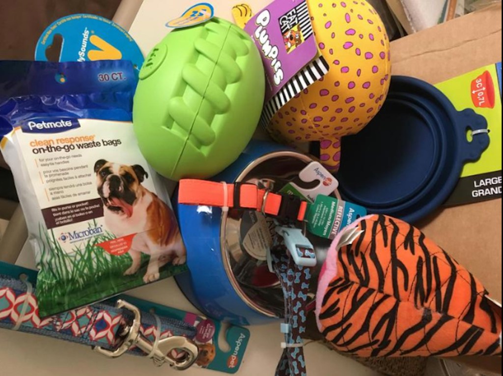 assortment of dog toys on table