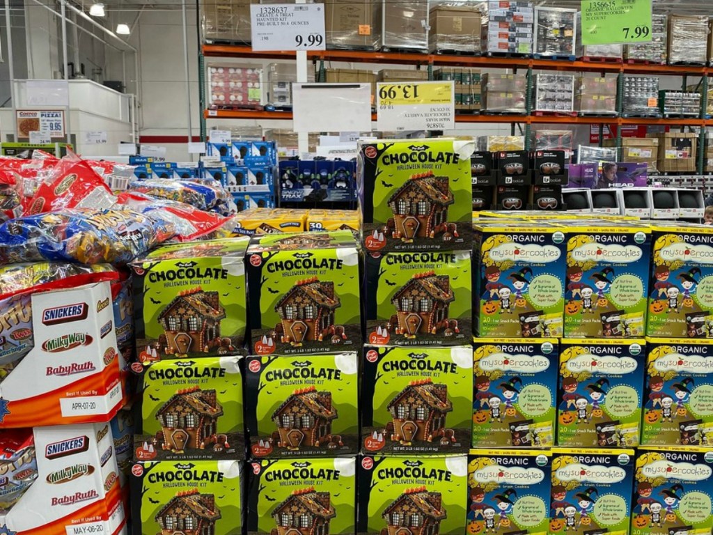 stacks of halloween house building kits in store
