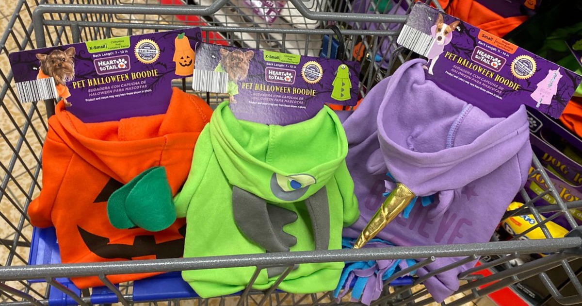 shopping cart with pet costumes in it
