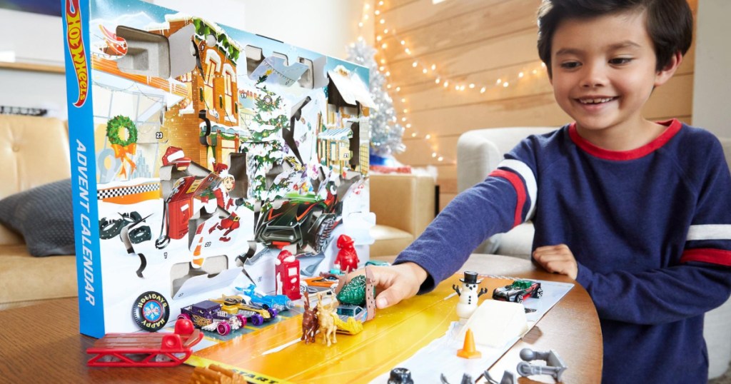 boy playing with Advent Calendar