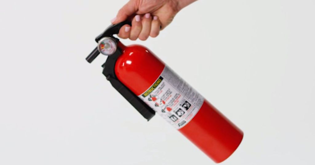 three Kidde fire extinguishers