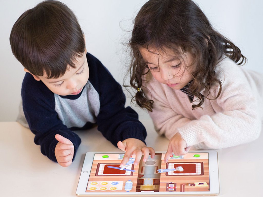 kids playing dr panda game on ipad