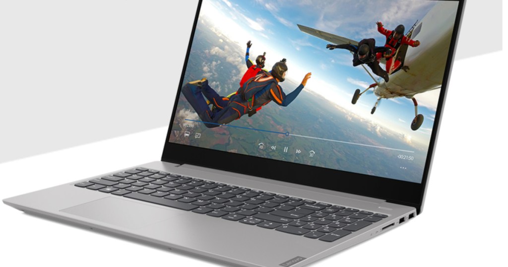 laptop with skydiving on the display