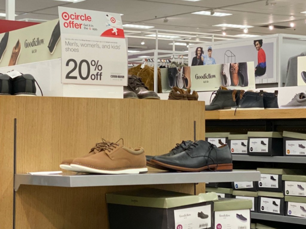mens shoes on display in store aisle