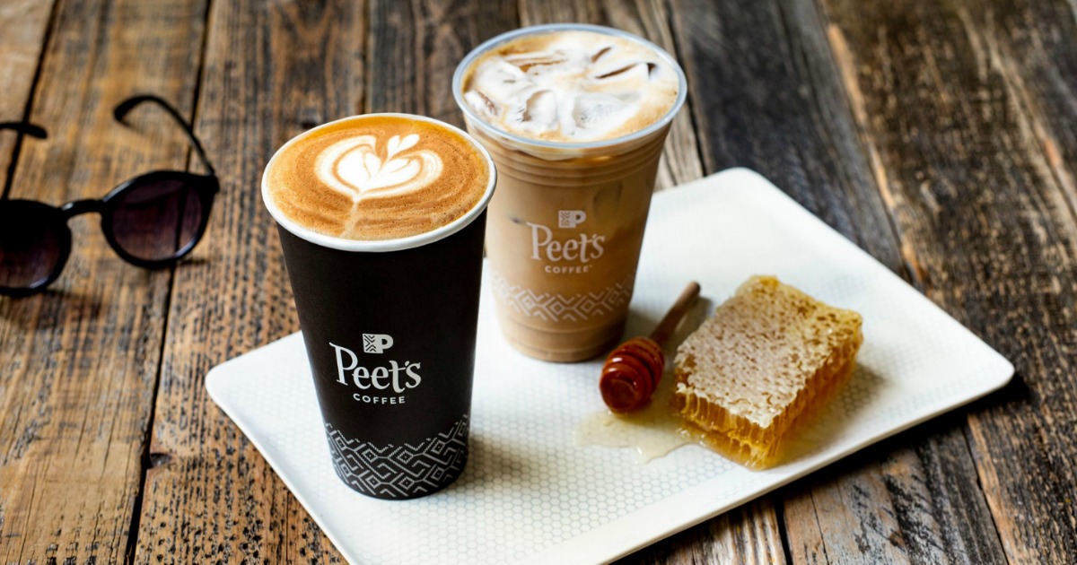 cups of coffee next to honeycomb on plate