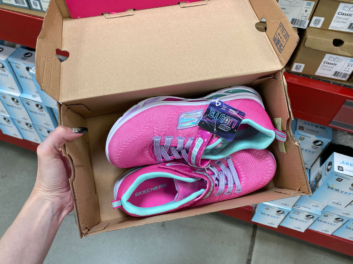 pair of pink light up Sketchers in box in Sam's Club store