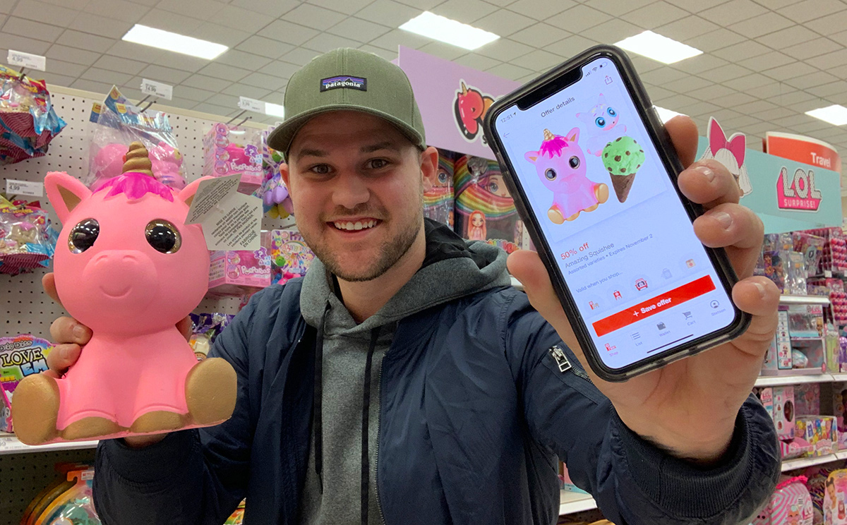 man using Target Circle app for toy discount