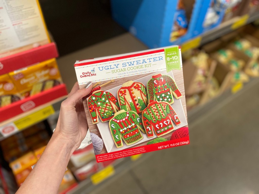 ugly sweater cookie kit held up in ALDI store aisle