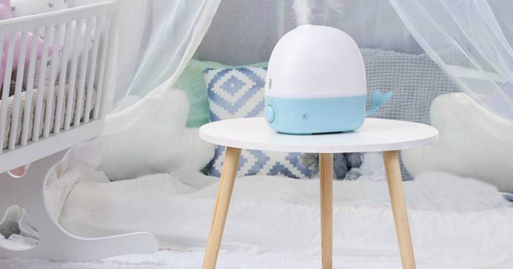 Baby whale Humidifier on a side table in a baby room