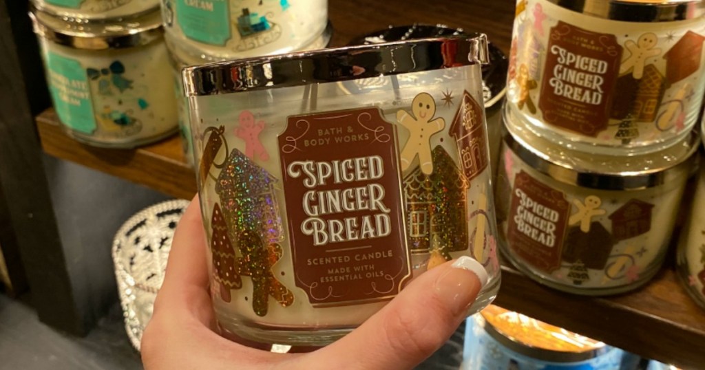 hand holding Bath & Body Works Spiced Gingerbread candle