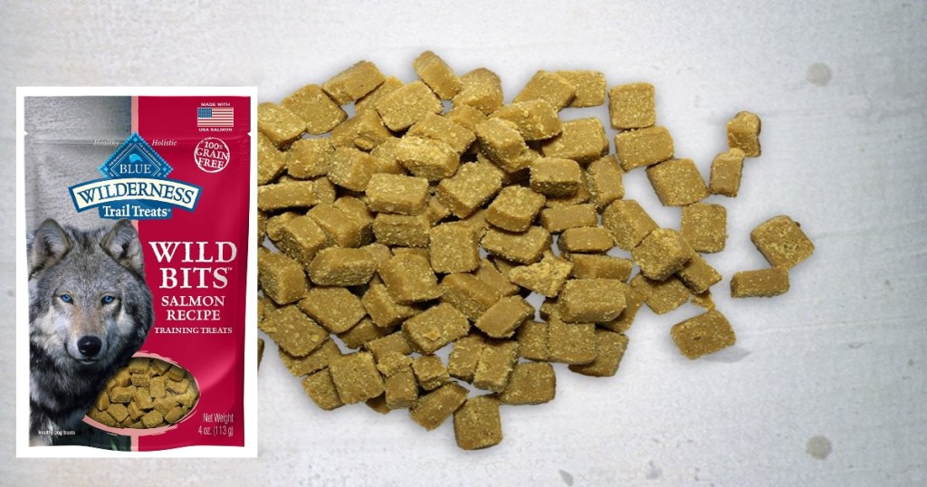 A bag of Blue Buffalo Dog treats next to a pile of the treats