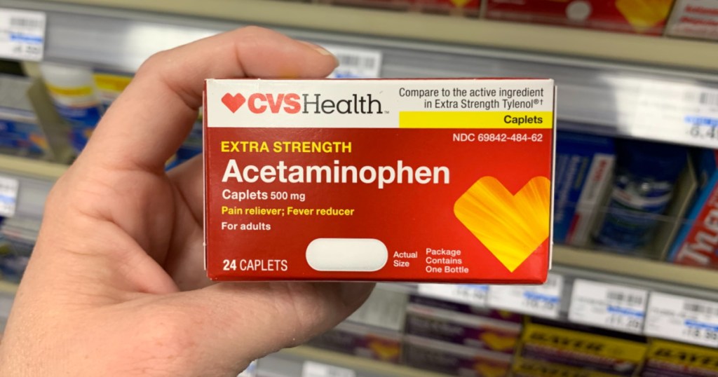 Hand holding CVS Acetaminophen