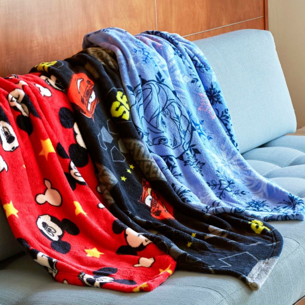 Disney Plush Throws laid on the back of a sofa