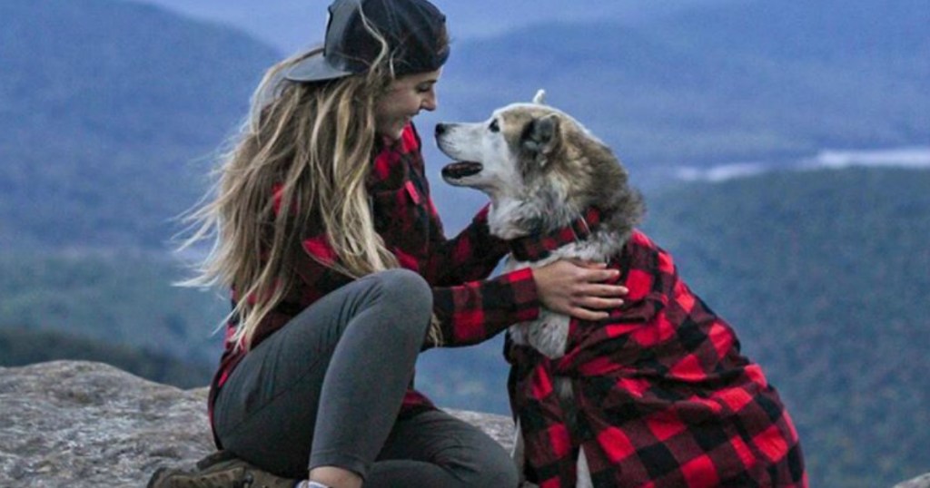woman and dog wearing Eddie Bauer Flannel shirts