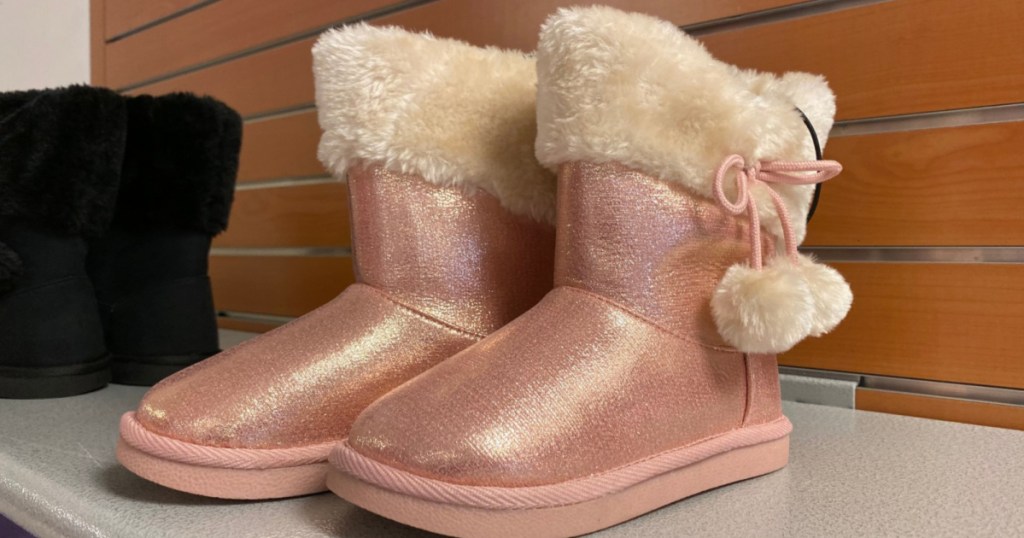 girls pink boots on shelf at jcpenney