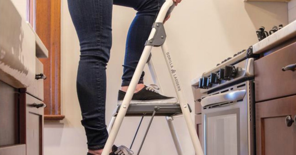 Woman stepping on Gorilla Compact Step Stool