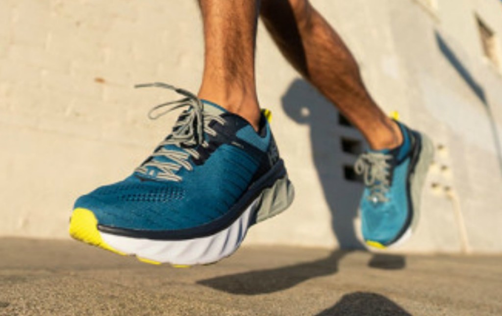 Man wearing Hoka One Men's Running Shoes