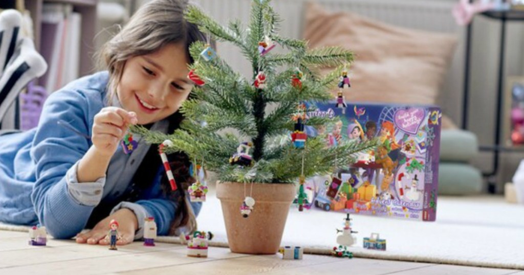 Girl playing with a LEGO Friends Advent Calendar 