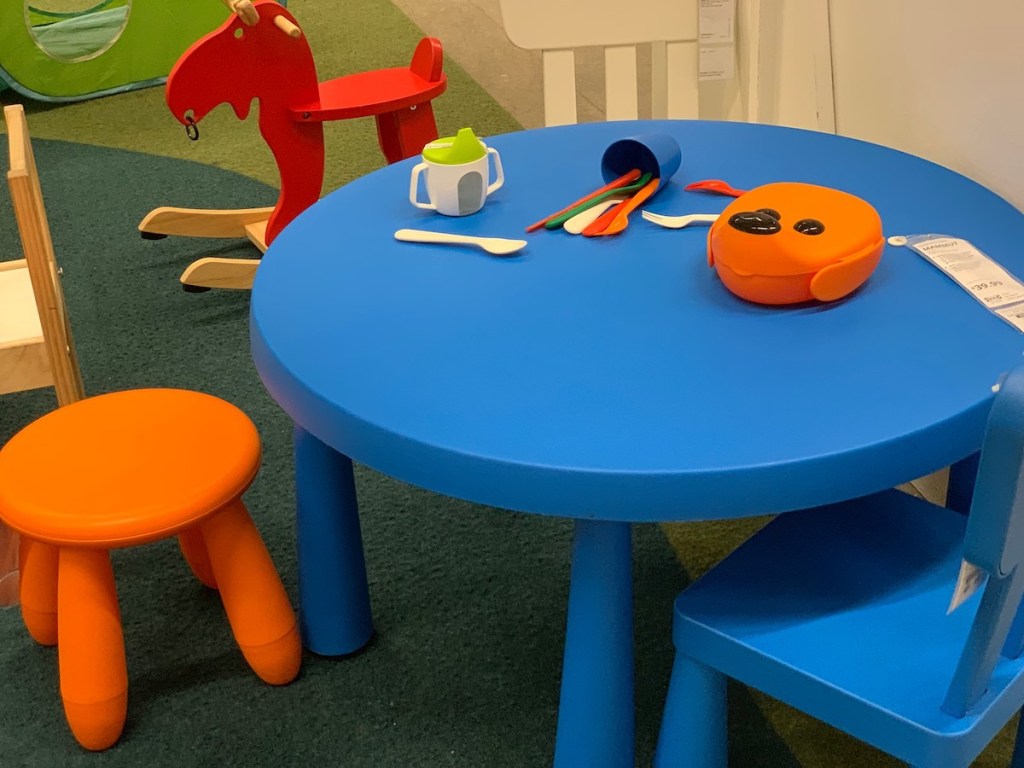 blue table with orange stool 