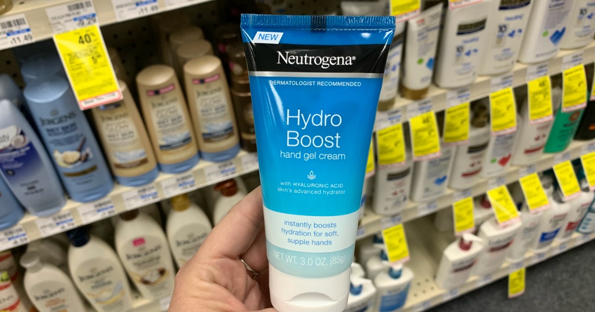 Hand holding Neutrogena in aisle