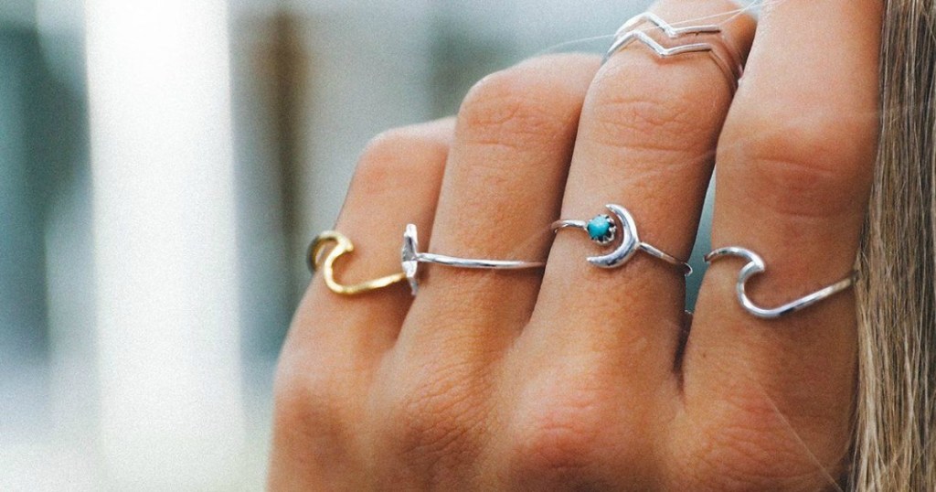 Girl wearing PURA Vida Wave Rings