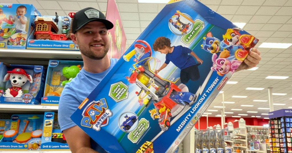 man holding Paw Patrol Lookout Tower