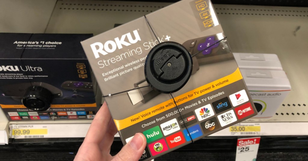hand holding Roku Streaming Stick+ in Target