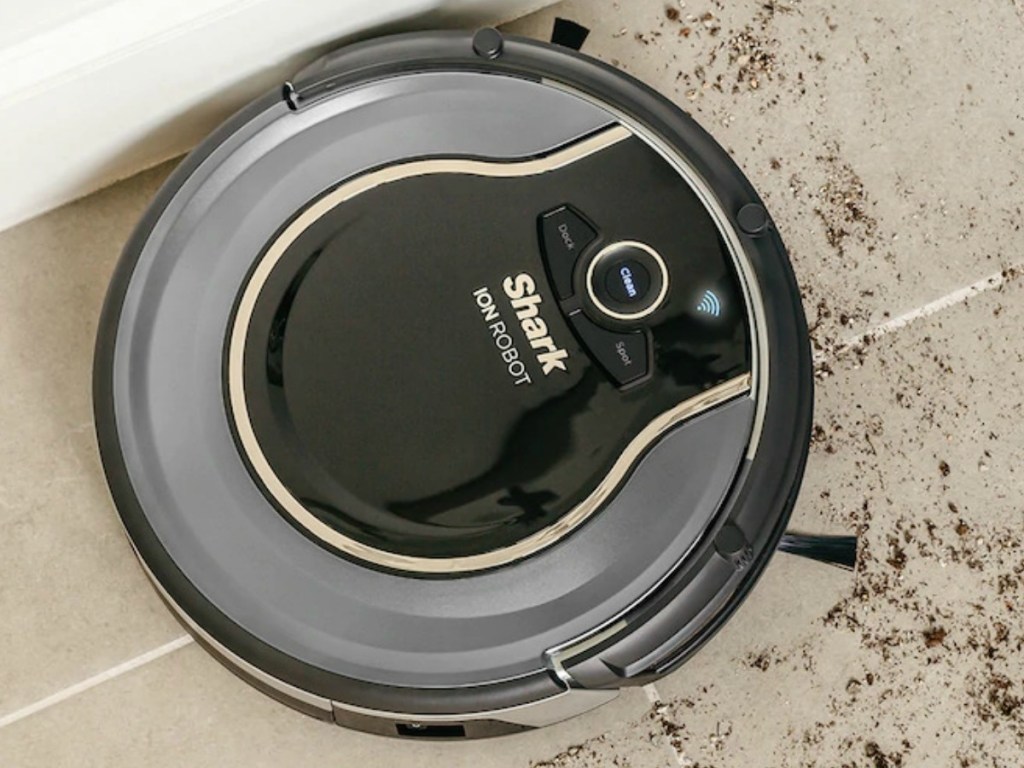 Shark ION Robotic Vacuum cleaning up dirt