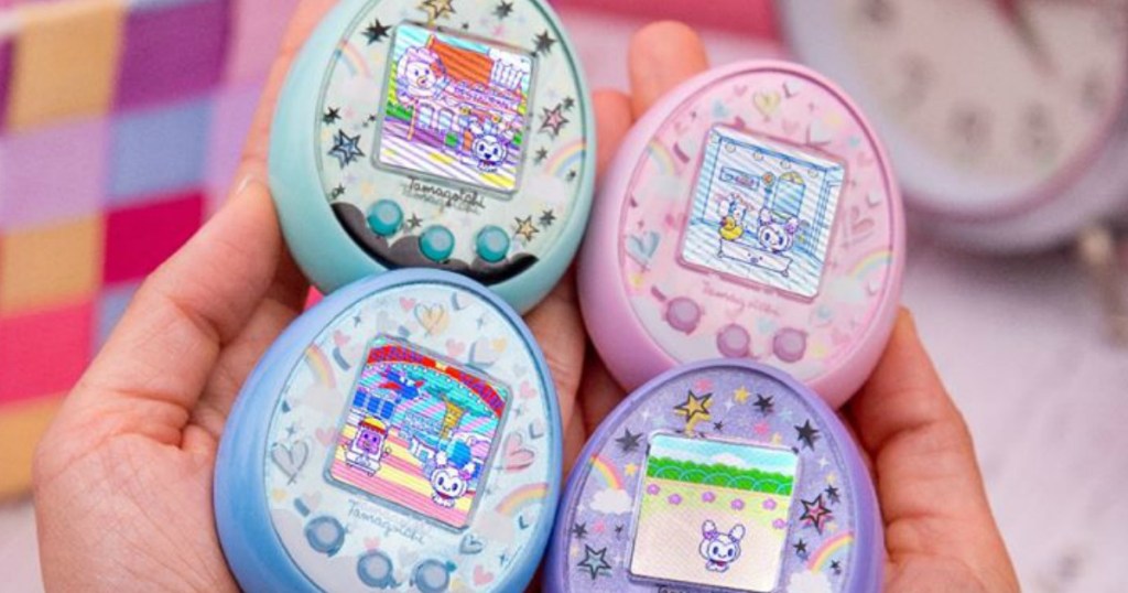 Tamagotchi On Fairy toys in hands