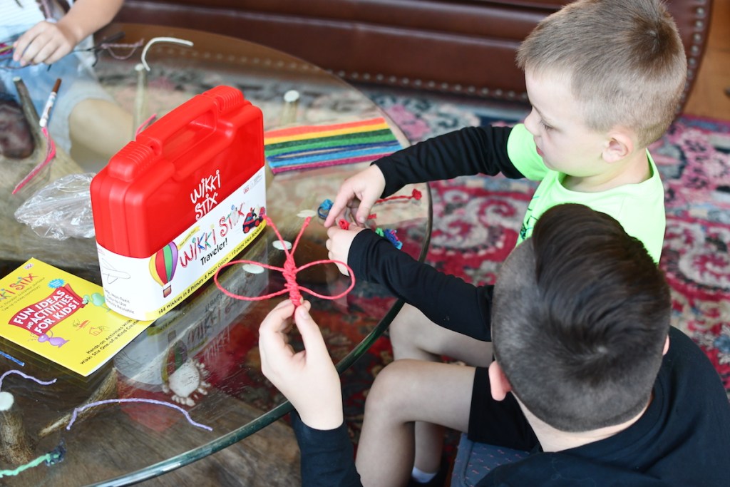 boys playing with Wikki Stix set