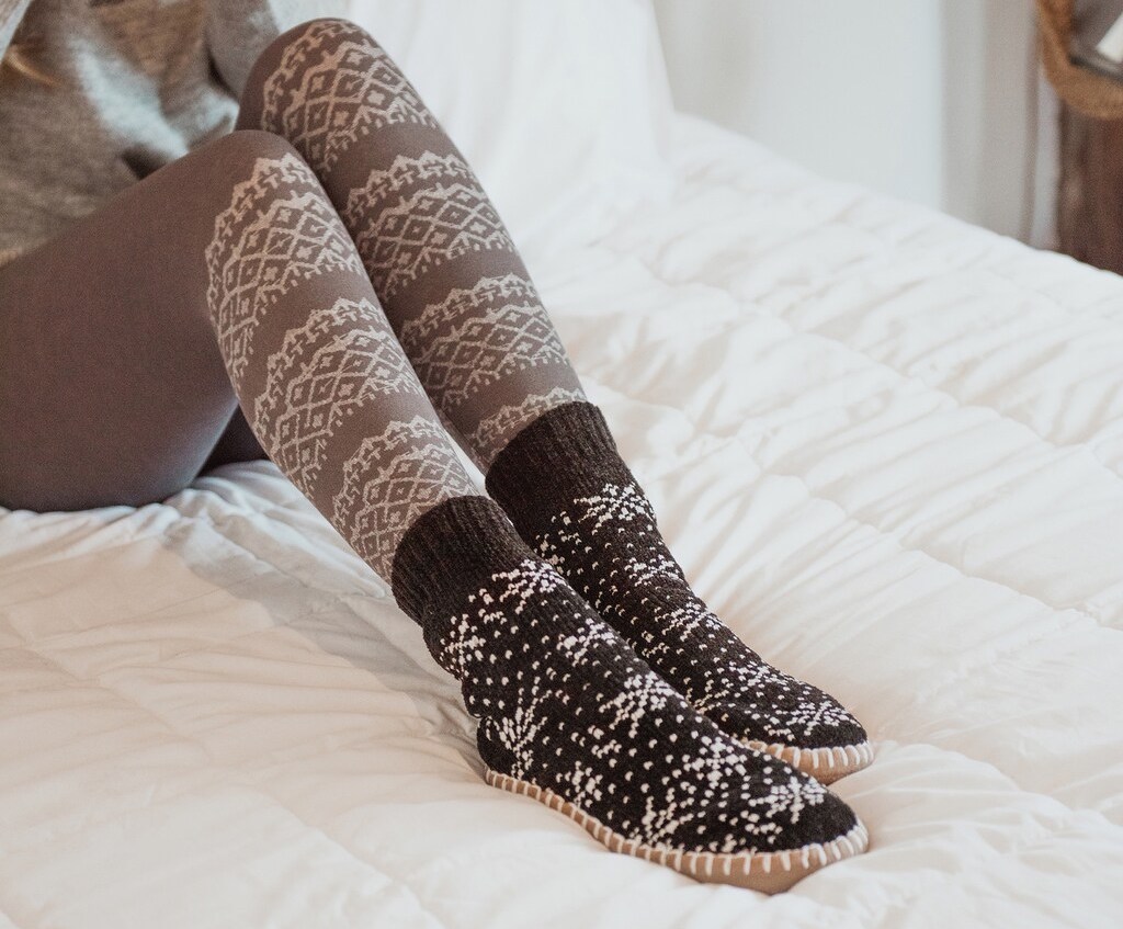 woman wearing MUK LUKS Chenille Short Slipper Socks