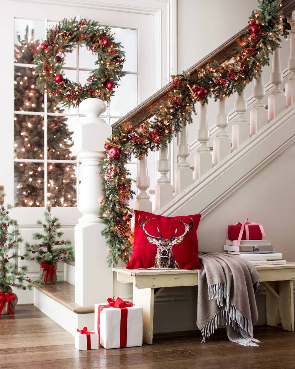 Christmas wreath and garland on stairs 