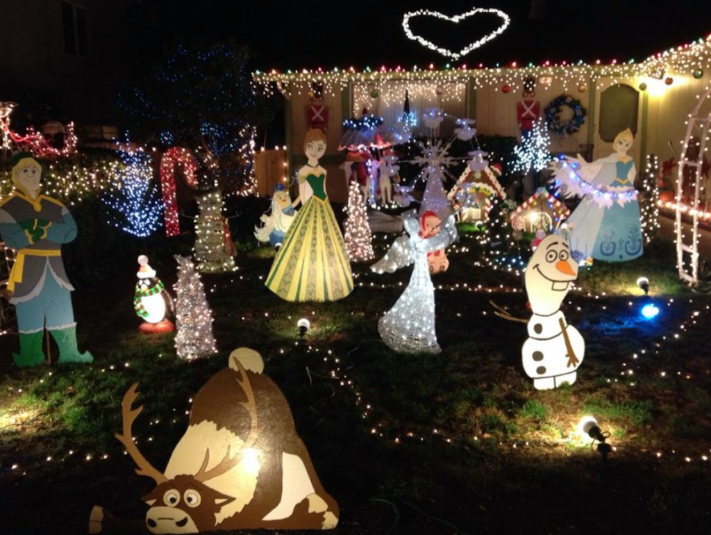 yard full of Christmas lights for frugal christmas traditions idea